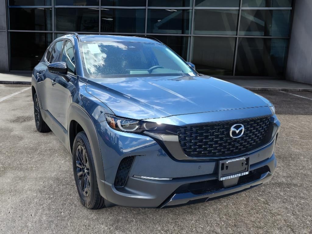 2026 Mazda Mazda CX-50 Hybrid Premium AWD in Ingot Blue Metallic — front three-quarter view