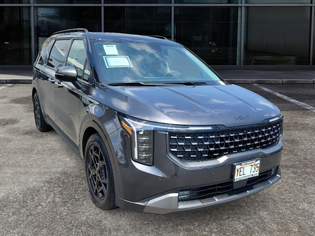 2026 Kia Carnival SX Prestige in Panthera Metal — front three-quarter view