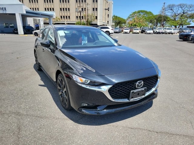 2026 Mazda Mazda3 Sedan 2.5 S Carbon Edition AWD in Jet Black Mica — front three-quarter view